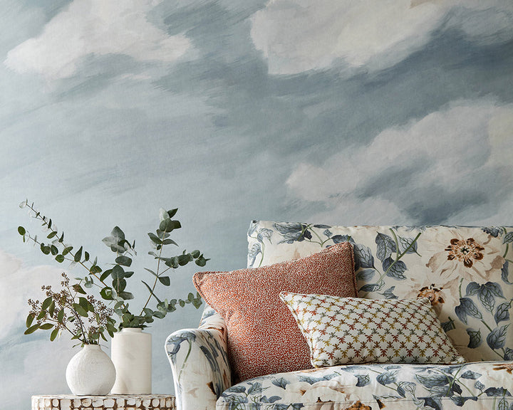 Harlequin Air Wallpaper behind a sofa