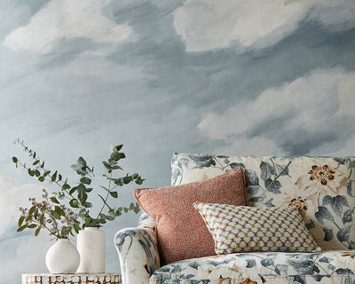 Harlequin Air Wallpaper behind a sofa