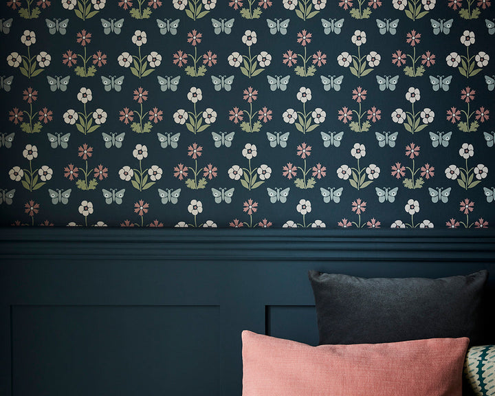 Little Greene Burges Butterfly Wallpaper in Hicks' Blue in a bedroom space close up