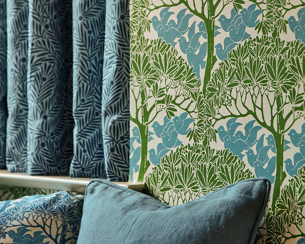 Morris & Co The Savaric Wallpaper in Garden Green in a lounge set up close up