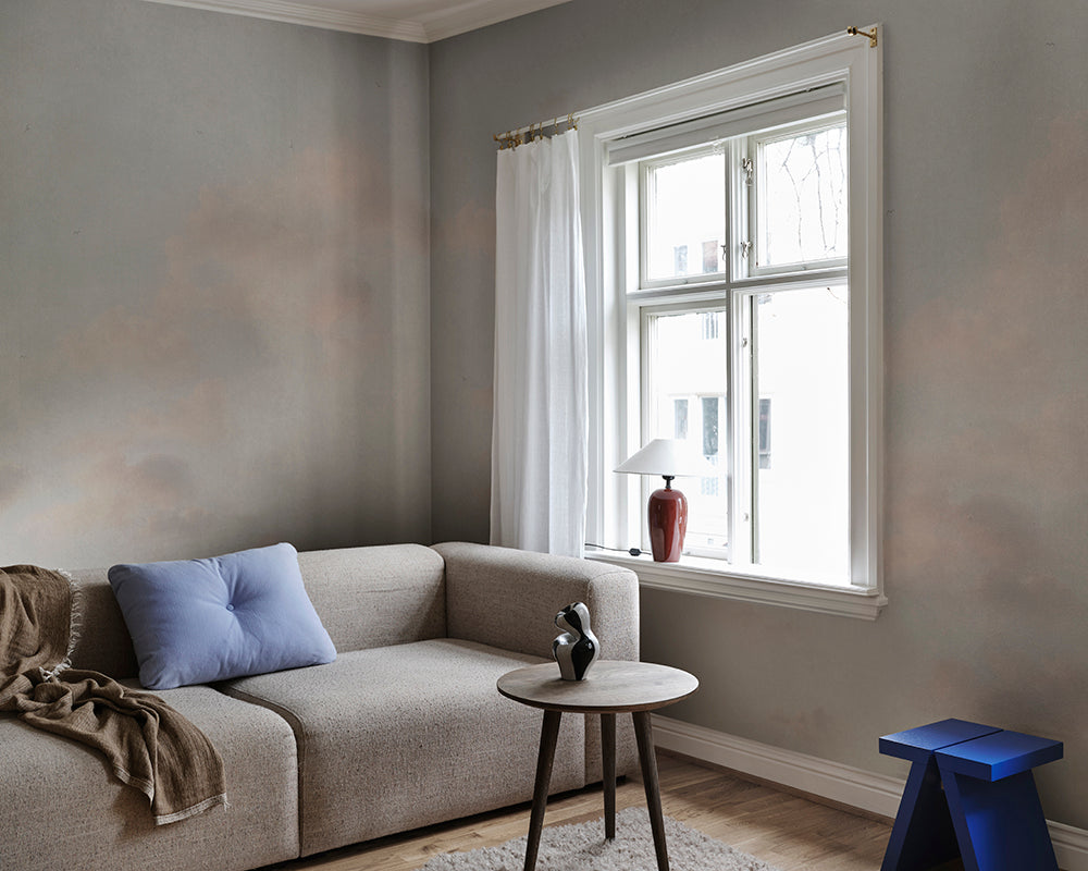 Sandberg Moln Wallpaper in blue on a living room wall