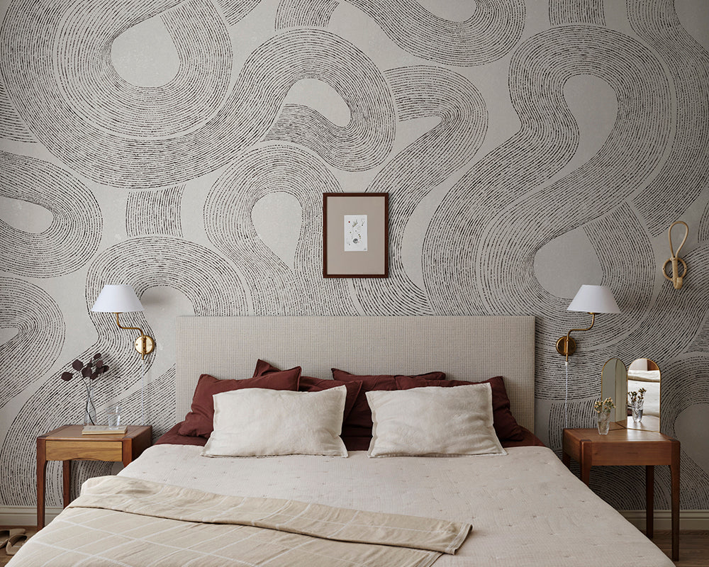 Sandberg Sand Wallpaper in graphite in a bedroom