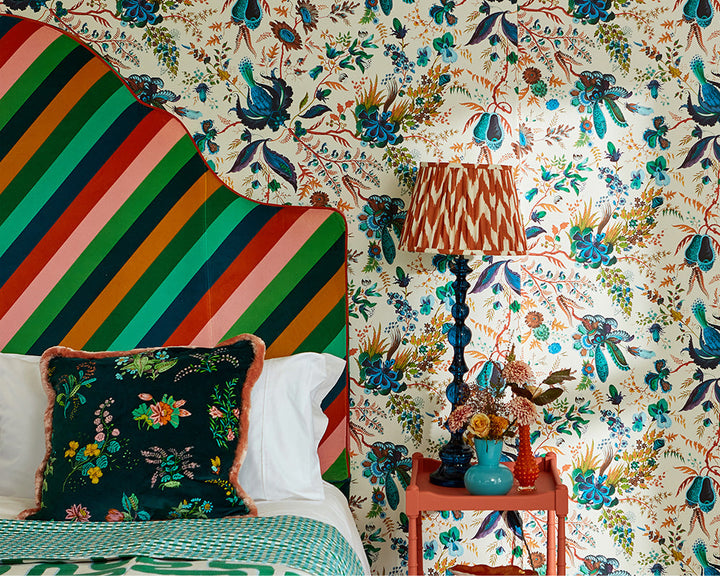 Harlequin Wonderland Floral Wallpaper in Spinel/Peridot/Pearl in a bedroom set up