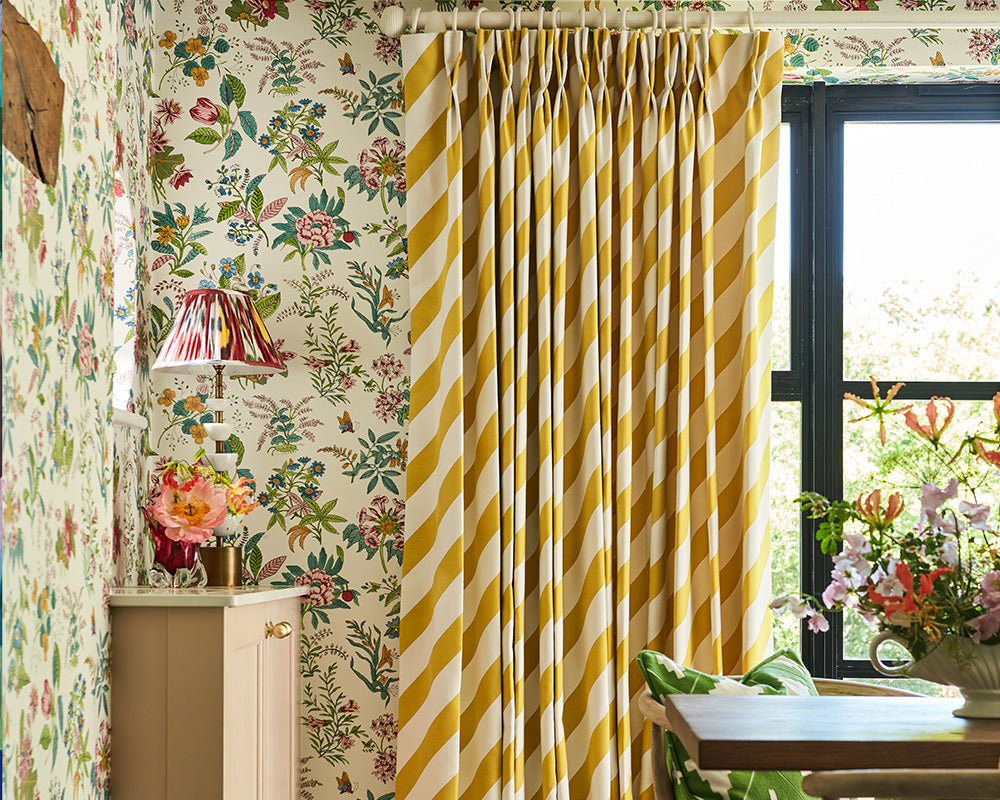 Harlequin Woodland Floral Wallpaper in Peridot/Ruby/Pearl in a dinning room set up