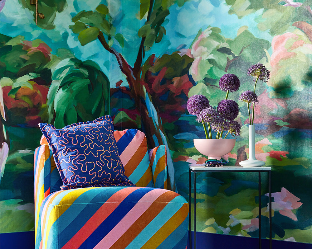 Harlequin In The Woods Wallpaper arrange in an office corner with armchair and side table