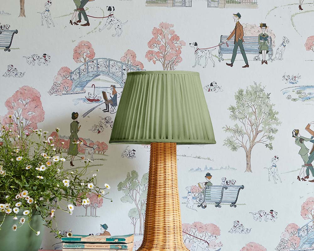 Sanderson 101 Dalmatians Wallpaper behind a lamp in a bedroom
