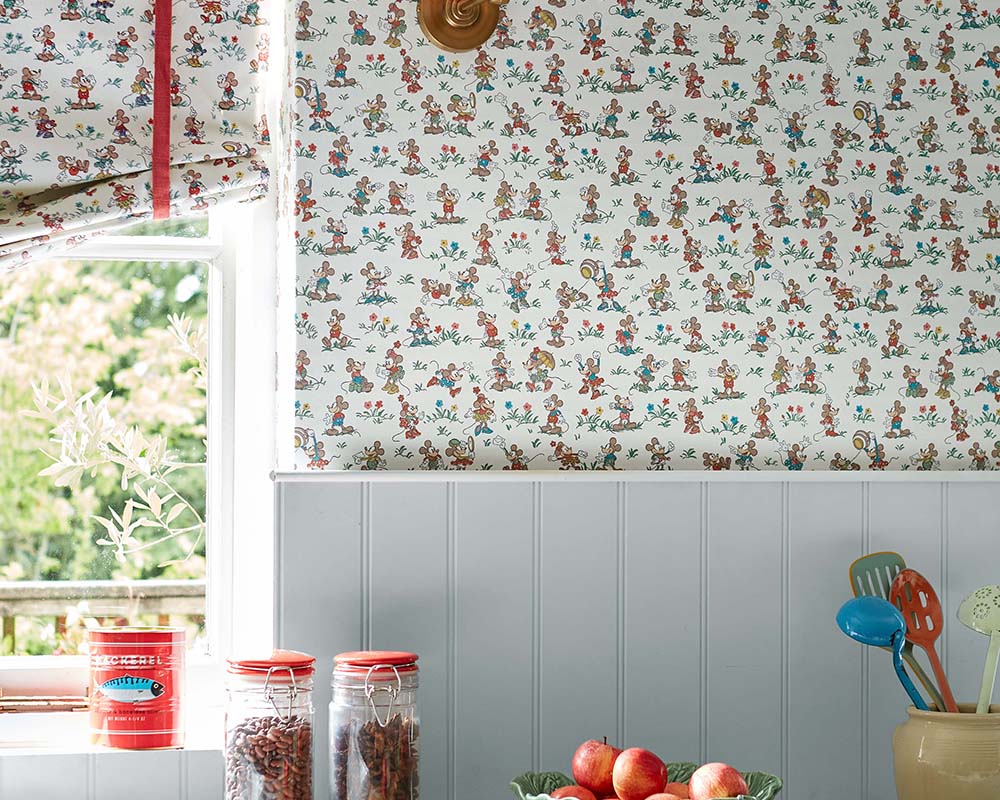 Sanderson Mickey & Minnie Wallpaper on a wall in a kitchen