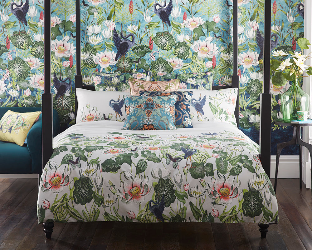 Clarke & Clarke Waterlily Wallpaper in a bedroom