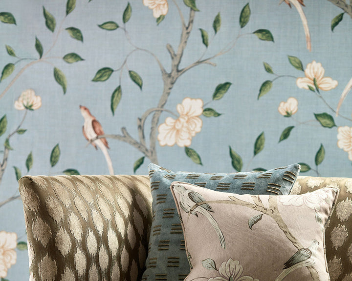 Zoffany Eleonora Print Wallpaper on a wall behind cushions