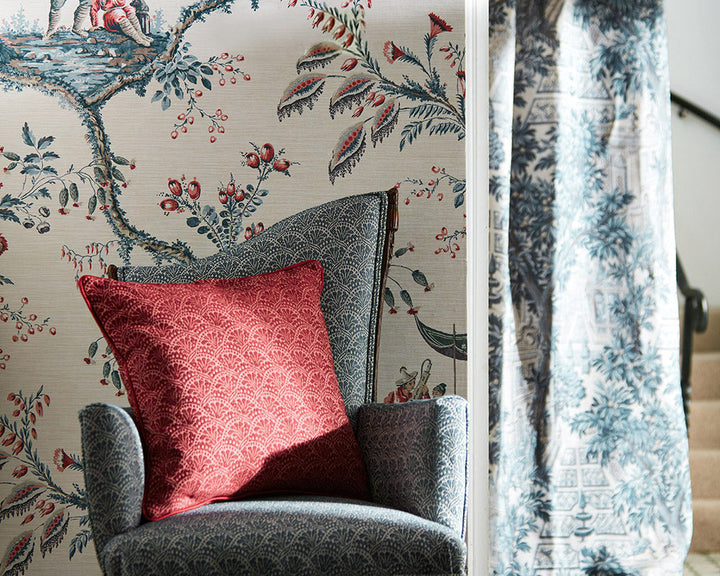 Zoffany Emperor's Musician Wallpaper on a wall with a chair