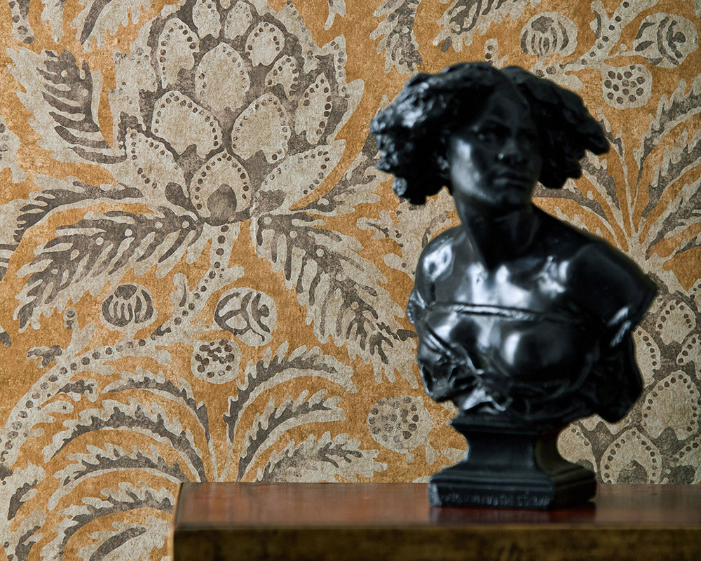 Zoffany Pina De Indes Wallpaper on a wall behind a bust
