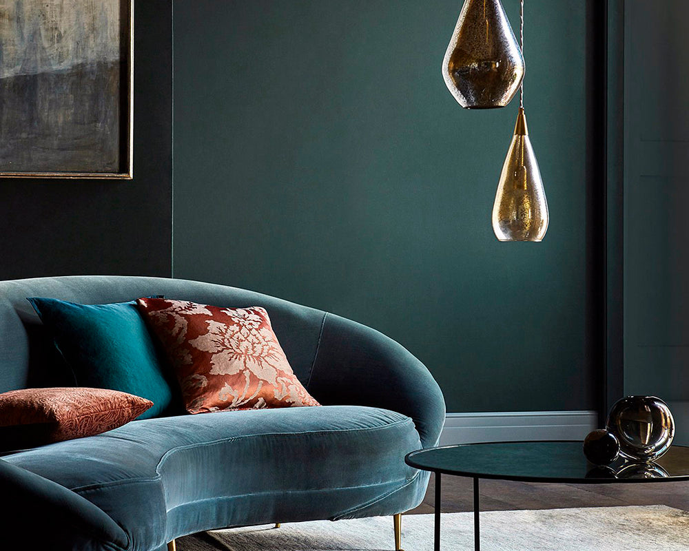 Zoffany Teal on living room walls with coordinating sofa